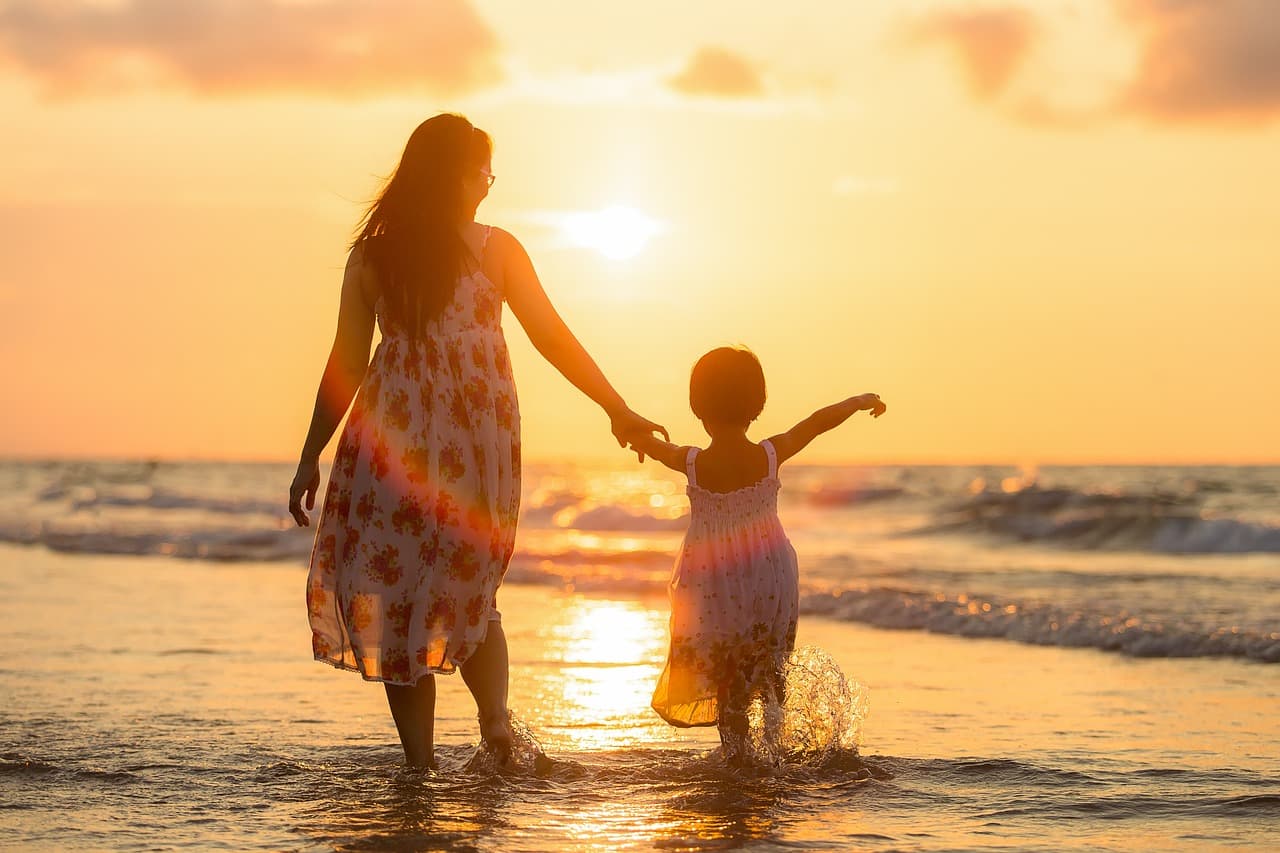 Mother and child at the beach
